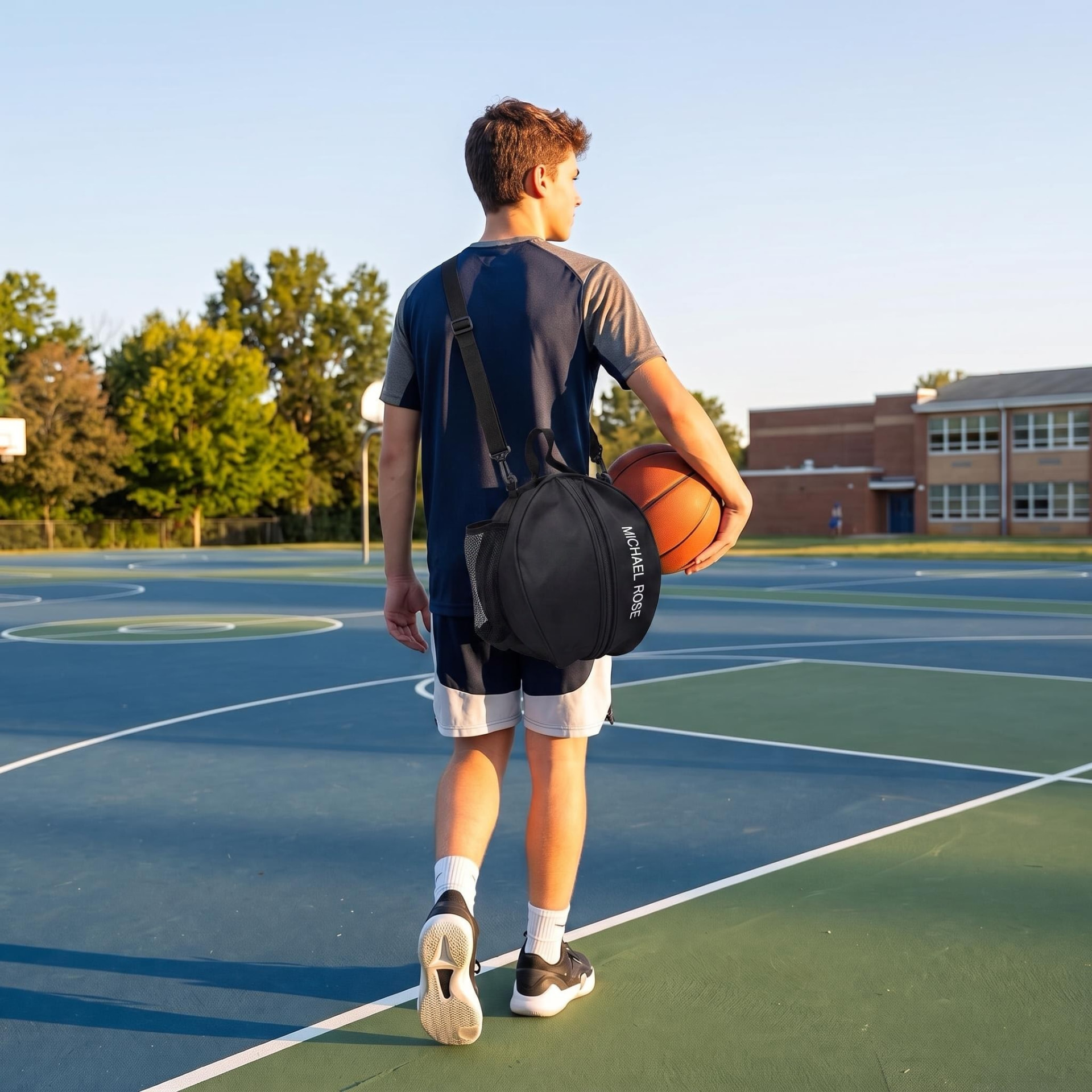 Player walking off court with a black kazevo Michael Rose sling ball bag