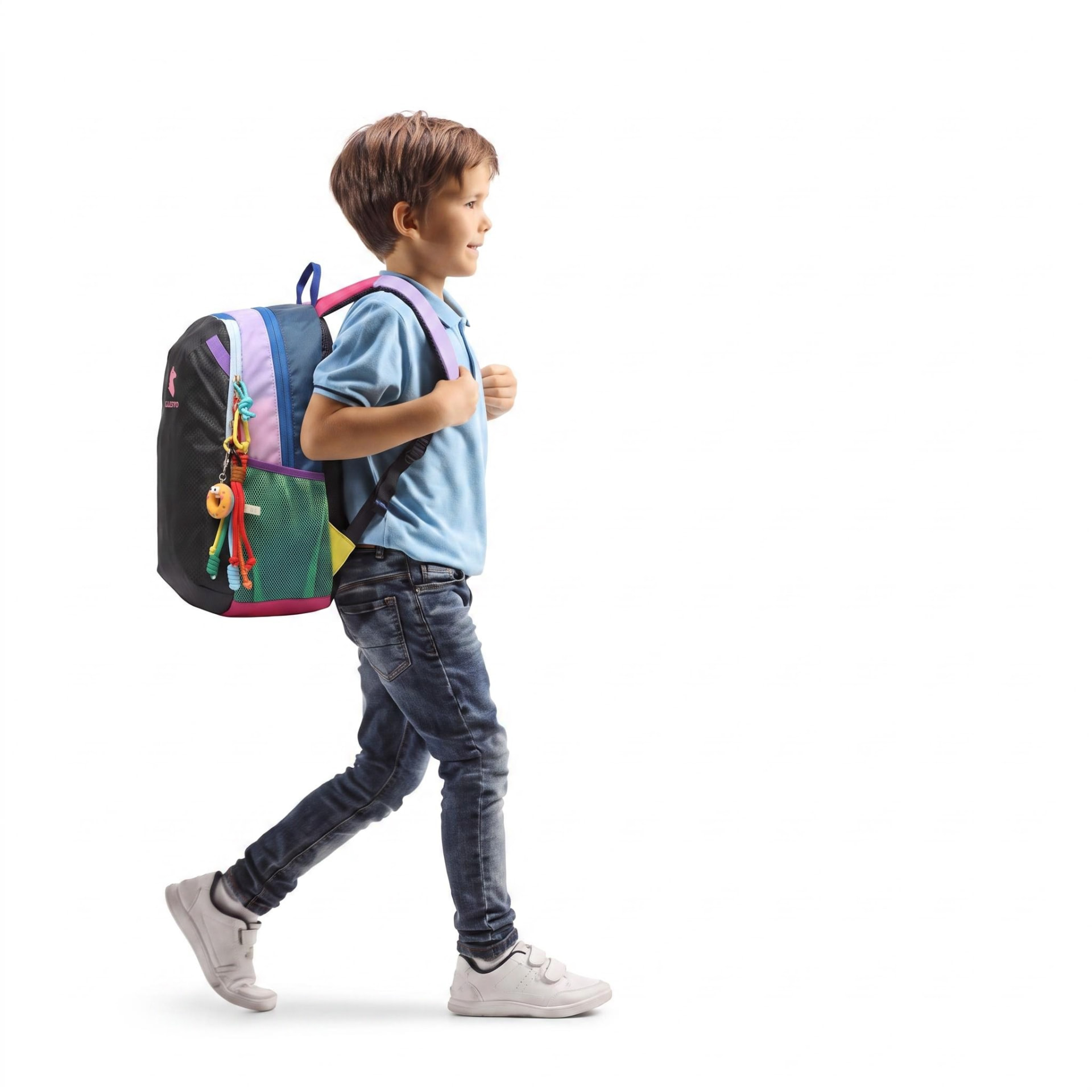 Boy walking to school wearing a colourful kazevo Mini backpack