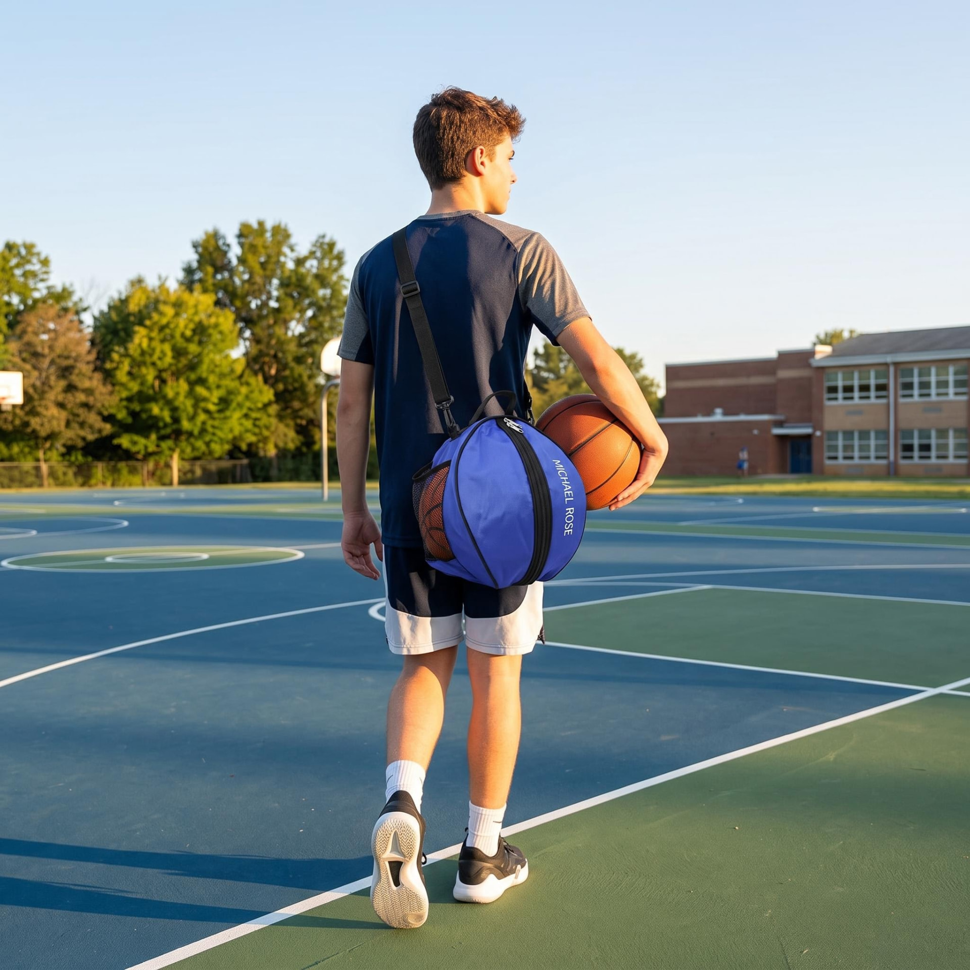 Blue kazevo Michael Rose sling ball bag worn crossbody on a school court